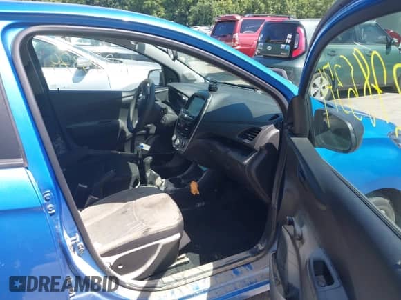 2018 Chevrolet Spark LS z VIN KL8CA6SA8JC477111, wystawiony jako IAAI lot #42785374 z przebiegiem 33 817 mil mil oraz . Historia ofert i sprzedaży dostępna na DreamBid. Obrazek 5.