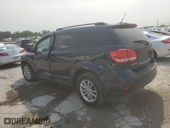 2014 Dodge Journey SXT with VIN 3C4PDCBBXET171609, listed as a Copart auction lot 67804315 with 127,593 mi miles and Salvage title. Bid and sale history available at DreamBid. Image 2.