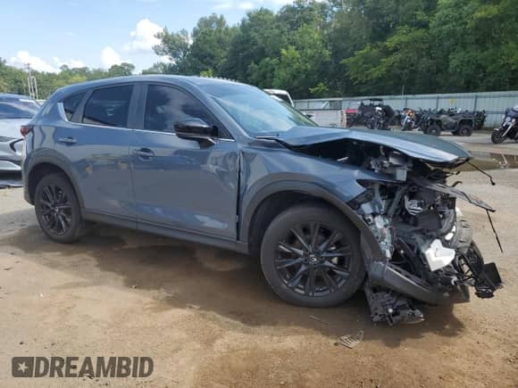 2022 Mazda CX-5 S Preferred z VIN JM3KFBCM1N0631579, wystawiony jako Copart lot #68084395 z przebiegiem Nie podano mil oraz Szkoda całkowita • Salvage title. Historia ofert i sprzedaży dostępna na DreamBid. Obrazek 4.