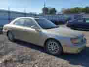 2002 Hyundai XG L с VIN KMHFU45EX2A209832, выставлен на аукционе Copart как лот 74524044 с пробегом Не указан миль и Списание • Salvage title. История ставок и продаж доступна на DreamBid. Изображение 4.