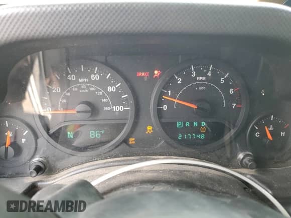 2008 Jeep Wrangler X с VIN 1J4FA24118L627350, выставлен на аукционе Copart как лот 82374345 с пробегом 217 748 миль миль и Списание • Salvage title. История ставок и продаж доступна на DreamBid. Изображение 9.