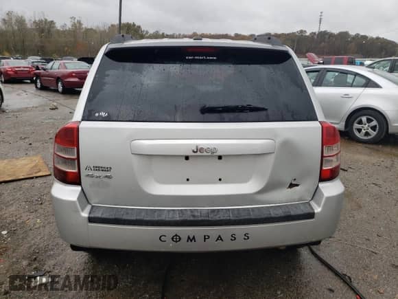 2010 Jeep Compass Latitude с VIN 1J4NF1FB1AD646011, выставлен на аукционе Copart как лот 79056184 с пробегом 178 737 миль миль и На запчасти • Non repairable. История ставок и продаж доступна на DreamBid. Изображение 6.
