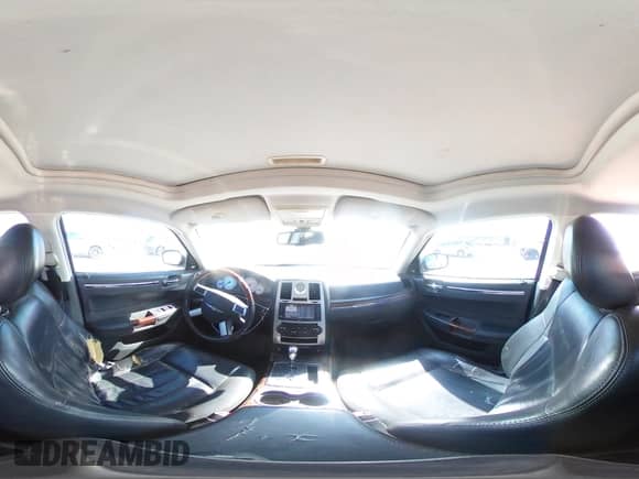 2010 Chrysler 300 C Hemi с VIN 2C3CA6CT3AH153427, выставлен на аукционе Copart как лот 67043635 с пробегом 122 616 миль миль и Списание • Salvage title. История ставок и продаж доступна на DreamBid. Изображение 14.