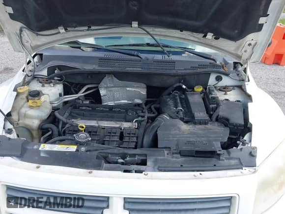 2008 Dodge Caliber SE with VIN 1B3HB28B88D675258, listed as a IAAI auction lot 42633251 with 178,471 mi miles and . Bid and sale history available at DreamBid. Image 10.