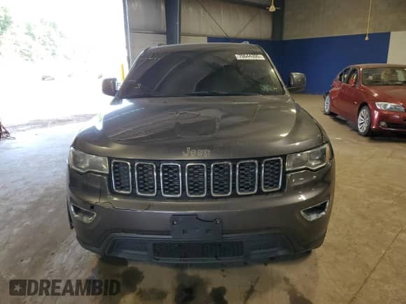 2017 Jeep Grand Cherokee Laredo with VIN 1C4RJEAG0HC746651, listed as a Copart auction lot 70644395 with 143,813 mi miles and Salvage title. Bid and sale history available at DreamBid. Image 5.