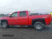 2013 Chevrolet Silverado 1500 LT with VIN 3GCPKSEAXDG145893, listed as a IAAI auction lot 41977764 with 144,817 mi miles and . Bid and sale history available at DreamBid. Image 14.