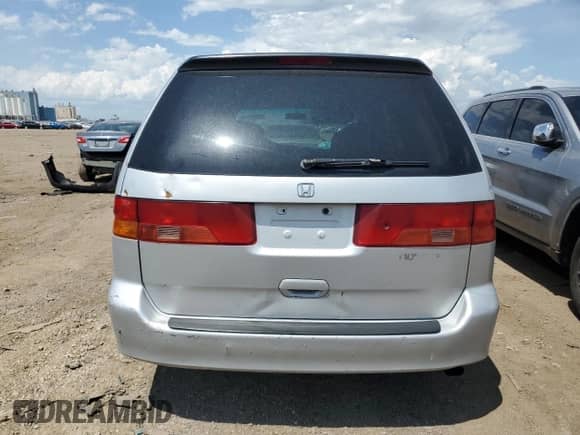 2001 Honda Odyssey LX с VIN 2HKRL185X1H616779, выставлен на аукционе Copart как лот 62356215 с пробегом Не указан миль и Списание • Salvage title. История ставок и продаж доступна на DreamBid. Изображение 6.
