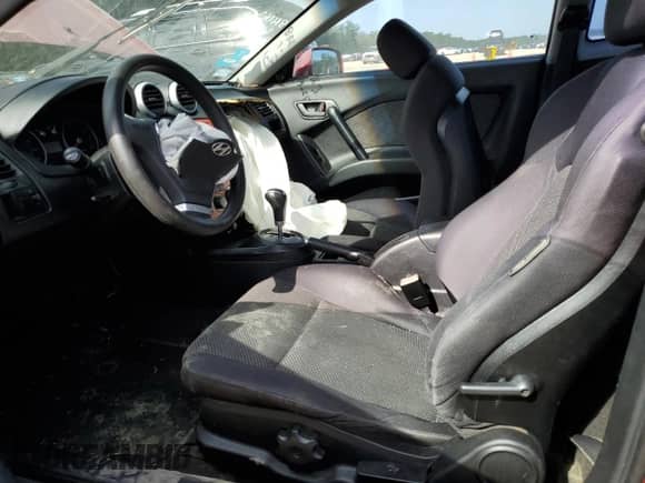 2006 Hyundai Tiburon GS с VIN KMHHM65D46U229462, выставлен на аукционе Copart как лот 70912605 с пробегом 169 009 миль миль и Списание • Salvage title. История ставок и продаж доступна на DreamBid. Изображение 7.