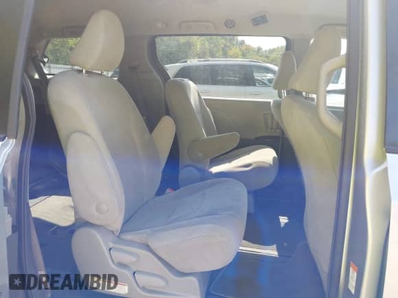 2019 Toyota Sienna L with VIN 5TDZZ3DC3KS982979, listed as a IAAI auction lot 43223149 with 266,225 mi miles and . Bid and sale history available at DreamBid. Image 8.
