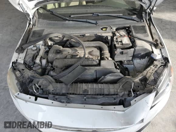 2015 Volvo S60 T5 Platinum с VIN YV1612TM8F2352980, выставлен на аукционе Copart как лот 82701654 с пробегом Не указан миль и Списание • Salvage title. История ставок и продаж доступна на DreamBid. Изображение 12.