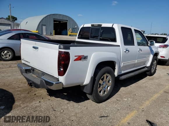 2012 Chevrolet Colorado 2LT with VIN 1GCHTDFE6C8141987, listed as a Copart auction lot 68915145 with 114,874 mi miles and Salvage title. Bid and sale history available at DreamBid. Image 3.