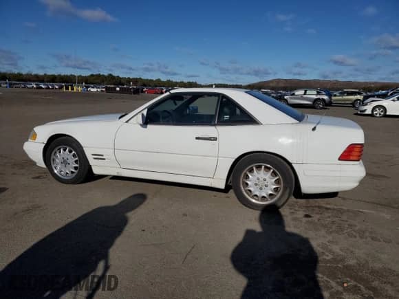 1997 Mercedes-Benz SL 500 с VIN WDBFA63F2VF146008, выставлен на аукционе Copart как лот 87655655 с пробегом 212 356 миль миль и Чистый • Clean title. История ставок и продаж доступна на DreamBid. Изображение 2.