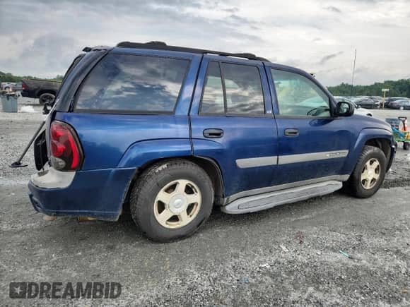 2003 Chevrolet TrailBlazer LT с VIN 1GNDS13SX32372413, выставлен на аукционе Copart как лот 70096635 с пробегом 343 877 миль миль и Списание • Salvage title. История ставок и продаж доступна на DreamBid. Изображение 3.