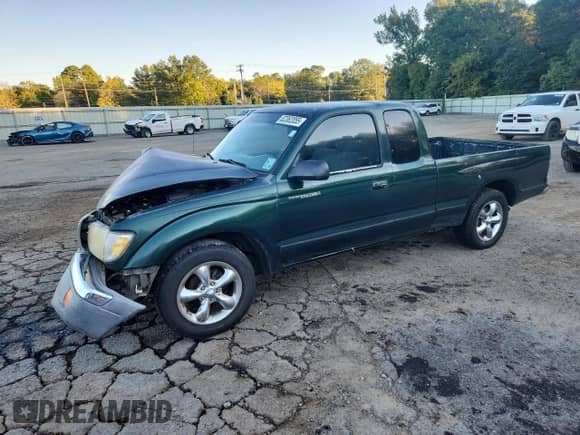 2000 Toyota Tacoma с VIN 4TAVL52N9YZ643663, выставлен на аукционе Copart как лот 82362055 с пробегом 299 059 миль миль и Списание • Salvage title. История ставок и продаж доступна на DreamBid. Изображение 1.
