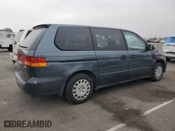 2004 Honda Odyssey LX with VIN 5FNRL18574B137609, listed as a Copart auction lot 68292805 with 172,873 mi miles and Salvage title. Bid and sale history available at DreamBid. Image 3.