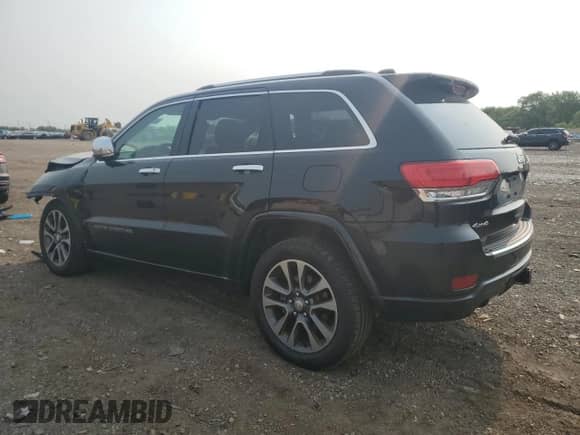 2017 Jeep Grand Cherokee Overland with VIN 1C4RJFCT8HC809088, listed as a Copart auction lot 59182625 with 73,285 mi miles and Salvage title. Bid and sale history available at DreamBid. Image 2.