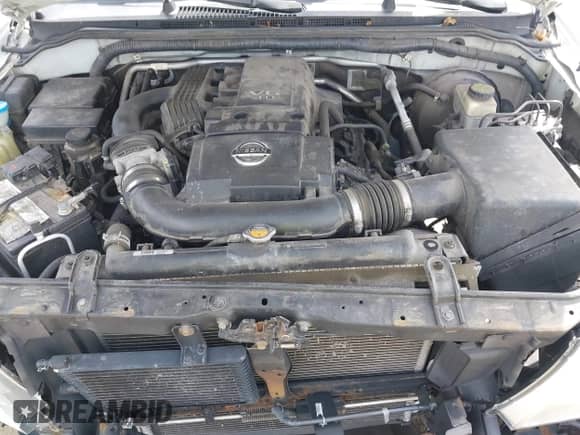 2014 Nissan Frontier Desert Runner z VIN 1N6AD0ER2EN748921, wystawiony jako IAAI lot #42143050 z przebiegiem 110 948 mil mil oraz . Historia ofert i sprzedaży dostępna na DreamBid. Obrazek 10.