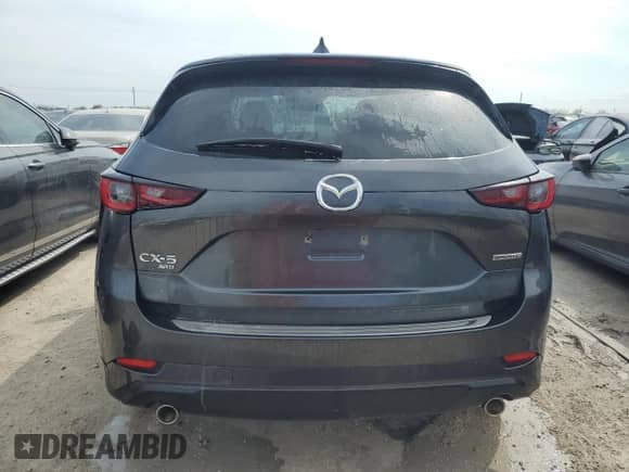 2024 Mazda CX-5 S Carbon Edition z VIN JM3KFBCL3R0415360, wystawiony jako Copart lot #74903154 z przebiegiem Nie podano mil oraz Nie do naprawy • Non repairable. Historia ofert i sprzedaży dostępna na DreamBid. Obrazek 6.