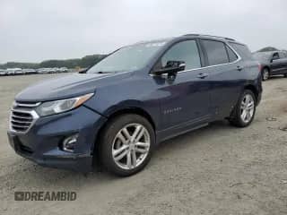 2018 Chevrolet Equinox Premier with VIN 3GNAXVEV7JL174306, listed as a Copart auction lot 60219475 with 80,679 mi miles and Salvage title. Bid and sale history available at DreamBid. Image 1.