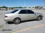 1997 Toyota Camry LE с VIN JT2BF22K0V0083043, выставлен на аукционе Copart как лот 80760315 с пробегом 194 236 миль миль и Списание • Salvage title. История ставок и продаж доступна на DreamBid. Изображение 3.