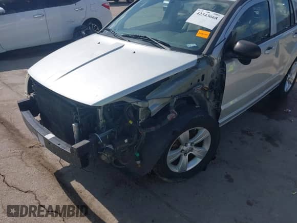 2010 Dodge Caliber SXT with VIN 1B3CB4HA7AD660883, listed as a IAAI auction lot 42270568 with 146,723 mi miles and . Bid and sale history available at DreamBid. Image 6.