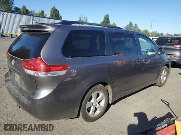 2011 Toyota Sienna LE with VIN 5TDKK3DC7BS121990, listed as a Copart auction lot 80665295 with 234,713 mi miles and Salvage title. Bid and sale history available at DreamBid. Image 3.