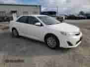 2014 Toyota Camry LE с VIN 4T4BF1FK4ER400120, выставлен на аукционе Copart как лот 82436625 с пробегом 73 368 миль миль и Списание • Salvage title. История ставок и продаж доступна на DreamBid. Изображение 4.
