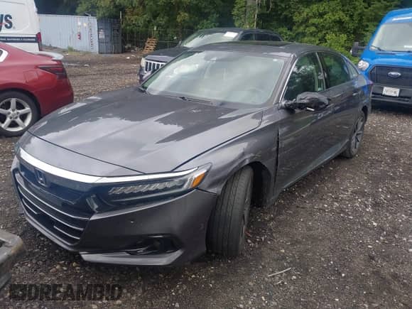 2022 Honda Accord EX-L z VIN 1HGCV1F56NA006721, wystawiony jako IAAI lot #43030981 z przebiegiem 102 894 mil mil oraz . Historia ofert i sprzedaży dostępna na DreamBid. Obrazek 2.