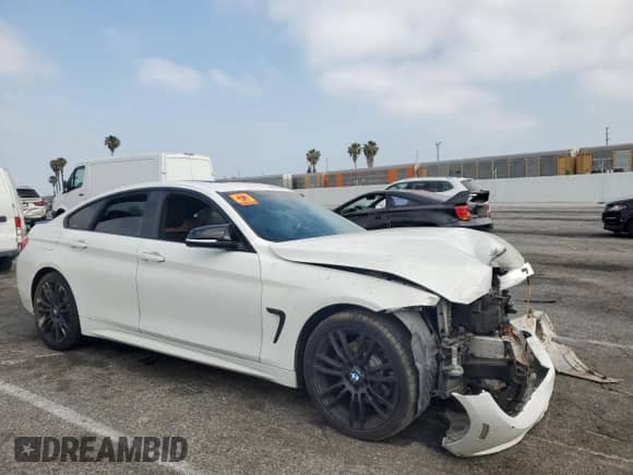 2015 BMW 4 Series 428i z VIN WBA4A9C51FD416289, wystawiony jako Copart lot #58756065 z przebiegiem 107 934 mil mil oraz Szkoda całkowita • Salvage title. Historia ofert i sprzedaży dostępna na DreamBid. Obrazek 4.