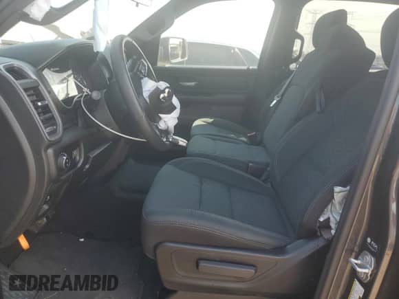 2025 Ram 1500 Tradesman with VIN 1C6RRFGG0SN646400, listed as a Copart auction lot 65794815 with 9,838 mi miles and Salvage title. Bid and sale history available at DreamBid. Image 7.