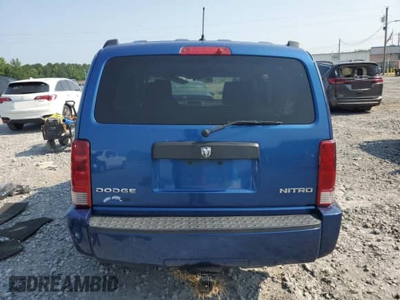 2009 Dodge Nitro SE с VIN 1D8GT28K39W541689, выставлен на аукционе Copart как лот 58440735 с пробегом 217 182 миль миль и Списание • Salvage title. История ставок и продаж доступна на DreamBid. Изображение 6.