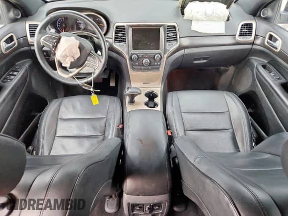 2014 Jeep Grand Cherokee Laredo с VIN 1C4RJEAGXEC145629, выставлен на аукционе Copart как лот 70733045 с пробегом 125 145 миль миль и Списание • Salvage title. История ставок и продаж доступна на DreamBid. Изображение 8.