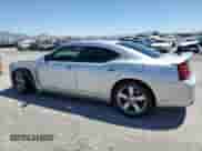 2006 Dodge Charger SRT-8 with VIN 2B3KA73W86H369838, listed as a Copart auction lot 52767384 with 165,630 mi miles and Salvage title. Bid and sale history available at DreamBid. Image 2.