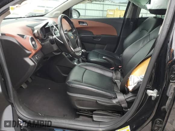 2012 Chevrolet Sonic LTZ с VIN 1G1JF6SH2C4113477, выставлен на аукционе Copart как лот 87371614 с пробегом 90 981 миль миль и Списание • Salvage title. История ставок и продаж доступна на DreamBid. Изображение 7.