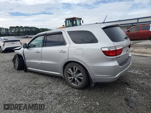 2013 Dodge Durango R/T with VIN 1C4SDHCT2DC617213, listed as a Copart auction lot 68803365 with 145,355 mi miles and Salvage title. Bid and sale history available at DreamBid. Image 2.