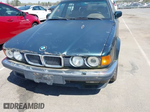 1994 BMW 7 Series with VIN WBAGD8327RDE89615, listed as a IAAI auction lot 41919045 with Not provided miles and . Bid and sale history available at DreamBid. Image 6.