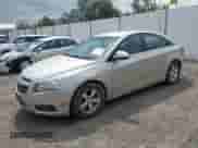 2013 Chevrolet Cruze LT with VIN 1G1PK5SB2D7109554, listed as a IAAI auction lot 42939613 with 155,175 mi miles and . Bid and sale history available at DreamBid. Image 2.