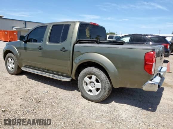 2005 Nissan Frontier SE with VIN 1N6AD07U15C402856, listed as a Copart auction lot 65883815 with 130,400 mi miles and Salvage title. Bid and sale history available at DreamBid. Image 2.