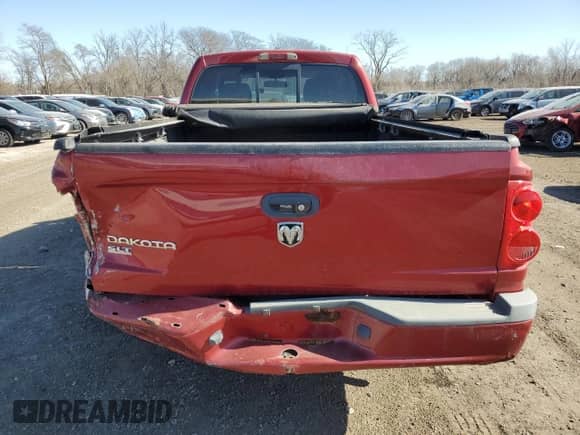 2007 Dodge Dakota SLT z VIN 1D7HE42K17S166610, wystawiony jako Copart lot #48807365 z przebiegiem 91 761 mil mil oraz Szkoda całkowita • Salvage title. Historia ofert i sprzedaży dostępna na DreamBid. Obrazek 6.