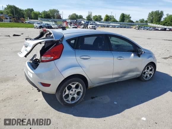 2011 Ford Fiesta SES with VIN 3FADP4FJ5BM200284, listed as a Copart auction lot 57276395 with 161,849 mi miles and Salvage title. Bid and sale history available at DreamBid. Image 3.