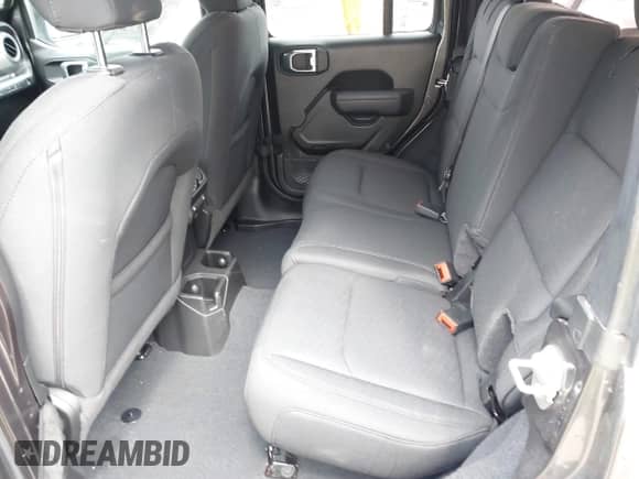 2022 Jeep Wrangler Unlimited Sport S с VIN 1C4HJXDG6NW180234, выставлен на аукционе IAAI как лот 41908743 с пробегом 50 704 миль миль и . История ставок и продаж доступна на DreamBid. Изображение 8.