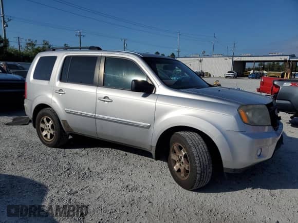 2010 Honda Pilot Touring с VIN 5FNYF4H87AB003161, выставлен на аукционе Copart как лот 89436975 с пробегом 160 834 миль миль и Чистый • Clean title. История ставок и продаж доступна на DreamBid. Изображение 4.