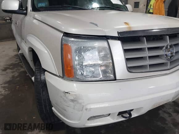 2004 Cadillac Escalade z VIN 1GYEK63N34R167569, wystawiony jako IAAI lot #43490315 z przebiegiem Nie podano mil oraz . Historia ofert i sprzedaży dostępna na DreamBid. Obrazek 6.