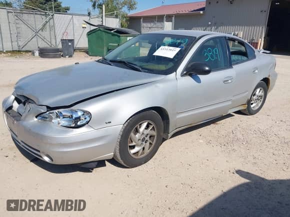 2004 Pontiac Grand Am SE1 with VIN 1G2NF52EX4C200337, listed as a IAAI auction lot 43313819 with Not provided miles and . Bid and sale history available at DreamBid. Image 2.