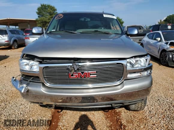 2002 GMC Sierra 1500 SLE with VIN 2GTEK19TX21244121, listed as a Copart auction lot 63050985 with 217,090 mi miles and Salvage title. Bid and sale history available at DreamBid. Image 5.