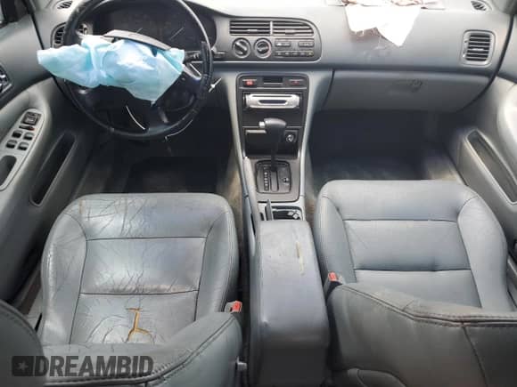 1996 Honda Accord EX z VIN 1HGCE6678TA014024, wystawiony jako Copart lot #62682674 z przebiegiem 238 989 mil mil oraz Szkoda całkowita • Salvage title. Historia ofert i sprzedaży dostępna na DreamBid. Obrazek 8.