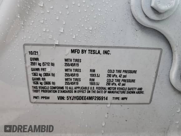 2021 Tesla Model Y Long Range z VIN 5YJYGDEE4MF295914, wystawiony jako Copart lot #85107055 z przebiegiem 49 996 mil mil oraz Szkoda całkowita • Salvage title. Historia ofert i sprzedaży dostępna na DreamBid. Obrazek 14.