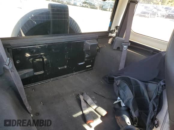 2000 Jeep Wrangler Sport with VIN 1J4FA49S1YP796600, listed as a Copart auction lot 82574545 with 128,340 mi miles and Clean title. Bid and sale history available at DreamBid. Image 11.