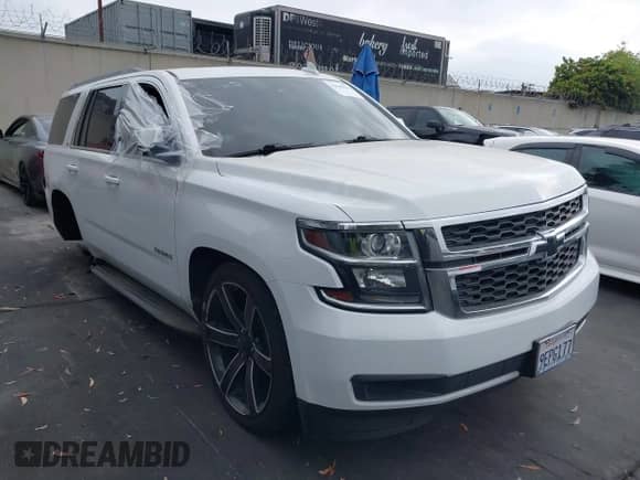 2018 Chevrolet Tahoe LT z VIN 1GNSCBKC1JR206967, wystawiony jako IAAI lot #42565511 z przebiegiem Nie podano mil oraz . Historia ofert i sprzedaży dostępna na DreamBid. Obrazek 1.