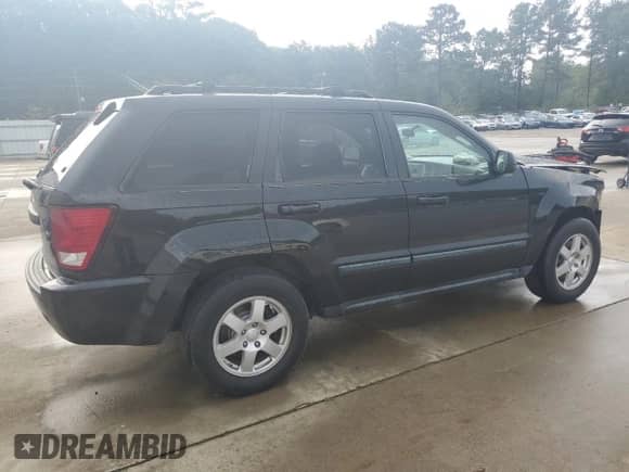 2009 Jeep Grand Cherokee Laredo with VIN 1J8GR48K99C531235, listed as a Copart auction lot 84378915 with 86,974 mi miles and Salvage title. Bid and sale history available at DreamBid. Image 3.